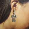 Silver Earrings by Thomas Jim