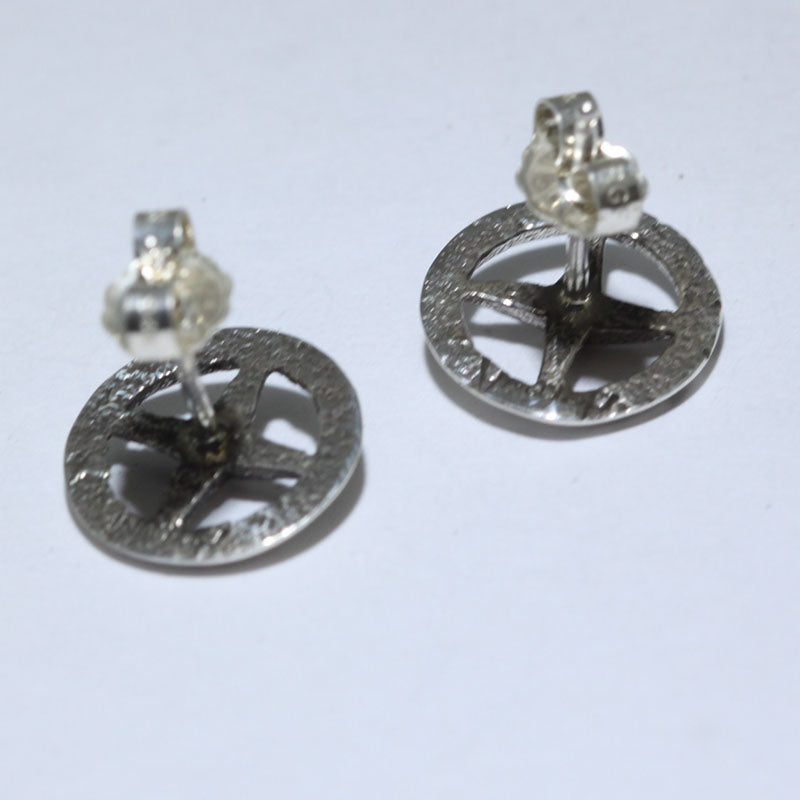 Tufa cast earrings by Aaron Anderson