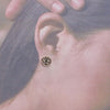 Tufa cast earrings by Aaron Anderson