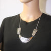 Overlay necklace by Berra Tarahongva