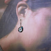 Earrings by Joe & Angie Reano